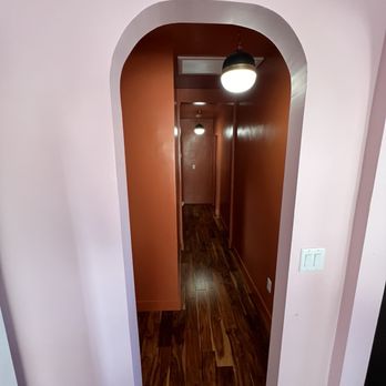 We The People Construction - Hallway with beautiful arches, retaining the original charm of the home - General Contractors Near Me - Hollywood, California We The People Construction - Hallway with beautiful arches, retaining the original charm of the home - General Contractors Near Me - Hollywood, California