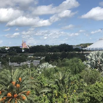 Chef Mickey's - Magic Kingdom in the distance (pink castle is Cinderella castle) - American Near Me - Lake Buena Vista, Florida Chef Mickey's - Magic Kingdom in the distance (pink castle is Cinderella castle) - American Near Me - Lake Buena Vista, Florida