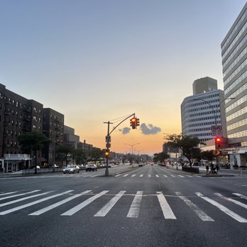 Rego Park - an empty street at sunset - Restaurants Near Me - Rego Park, New York Rego Park - an empty street at sunset - Restaurants Near Me - Rego Park, New York