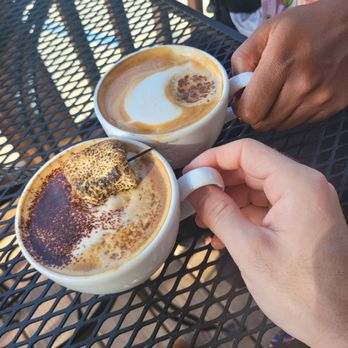 Kentzo Koffee - We got the smores coffee with a beautiful marshmelo garnish. And the "gingerbread" with a small cookie floating on top . - Coffee & Tea Near Me - O'Fallon, Missouri Kentzo Koffee - We got the smores coffee with a beautiful marshmelo garnish. And the "gingerbread" with a small cookie floating on top . - Coffee & Tea Near Me - O'Fallon, Missouri