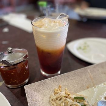 Sukhothai - a plate of noodles and a drink - Thai Near Me - Rochester Hills, Michigan Sukhothai - a plate of noodles and a drink - Thai Near Me - Rochester Hills, Michigan
