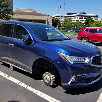 Westchester Marriott - July 9 2018 that is just next to the front lobby of Marriott. Brand new car all four wheels were taken over night. - Hotels Near Me - Tarrytown, New York Westchester Marriott - July 9 2018 that is just next to the front lobby of Marriott. Brand new car all four wheels were taken over night. - Hotels Near Me - Tarrytown, New York