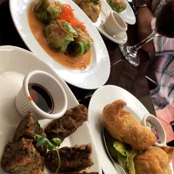 Chok Dee Thai Kitchen - fried chive cakes (bottom left); curry puffs (bottom right); with a bunch of dumplings - Thai Near Me - Norwood, New Jersey Chok Dee Thai Kitchen - fried chive cakes (bottom left); curry puffs (bottom right); with a bunch of dumplings - Thai Near Me - Norwood, New Jersey