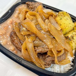 Dom Cuisine - Delicious creamy onions steak, with rice, beans, and buttered potatoes.
