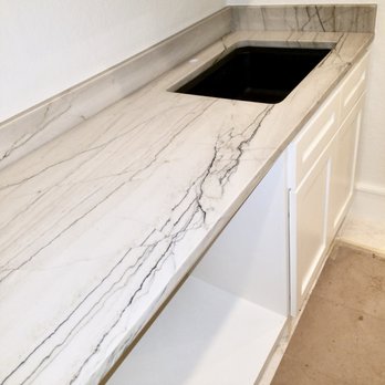 Stones & Designers - Macaubas White Quartzite 3 cm. With black undermounted sink for a laundry. - Countertop Installation Near Me - Magnolia, Texas Stones & Designers - Macaubas White Quartzite 3 cm. With black undermounted sink for a laundry. - Countertop Installation Near Me - Magnolia, Texas