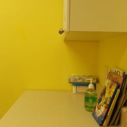 Pediatric Partners of Northern Kentucky Psc - Counter with hand sanitizer, books, wipes and tissues