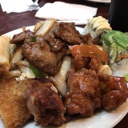 a plate of food and a cup of soup