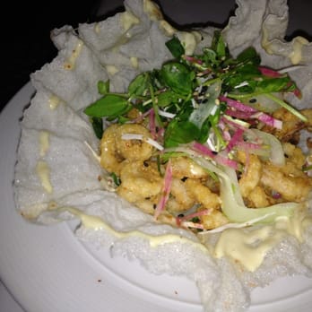 Spago - Spicy calamari, greens, glazed with red chili sweet sauce on a rice paper shell - Asian Fusion Near Me - Maui, Hawaii Spago - Spicy calamari, greens, glazed with red chili sweet sauce on a rice paper shell - Asian Fusion Near Me - Maui, Hawaii
