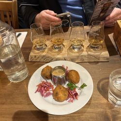 Auld Hundred - Haggis bonbons with whiskey flight