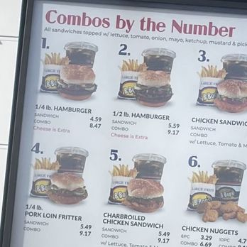 B-Bops - Well lite Big Food Display Board - A menu board titled 'Combos by the Number' shows different burger options with prices, including sandwiches with fries and drinks. - Burgers Near Me - Des Moines, Iowa