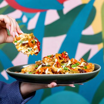Redbird Scratch Kitchen + Bar - Green Chili Bacon Waffle Fries - Chicken Wings Near Me - Tucson, Arizona Redbird Scratch Kitchen + Bar - Green Chili Bacon Waffle Fries - Chicken Wings Near Me - Tucson, Arizona