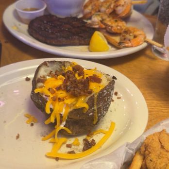 Texas Roadhouse - Sirloin* & Grilled Shrimp Baked Potato - Steakhouses Near Me - Sevierville, Tennessee Texas Roadhouse - Sirloin* & Grilled Shrimp Baked Potato - Steakhouses Near Me - Sevierville, Tennessee