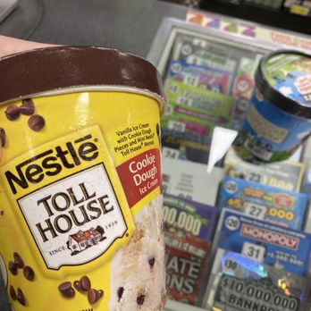 7-Eleven - a person holding a cup of ice cream - Convenience Stores Near Me - Escondido, California