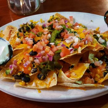 Spokes On Southern - Nachos! I haven't tried them yet, but they sure look yummy! - New American Near Me - Tempe, Arizona Spokes On Southern - Nachos! I haven't tried them yet, but they sure look yummy! - New American Near Me - Tempe, Arizona