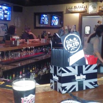 U.A. Pub - a bar with a beer on the counter - Pubs Near Me - Columbus, Ohio U.A. Pub - a bar with a beer on the counter - Pubs Near Me - Columbus, Ohio