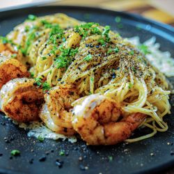 Catering AZ - Roasted garlic shrimp scampi finished with fresh parsley and black garlic, flake serve served with Pechman pepper dusted prawns