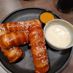 Stillwaters Restaurant - Pretzel sticks with queso and smoky mustard