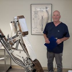 Metrowest Chiropractic Associates - Dr Hartigan in am exam room