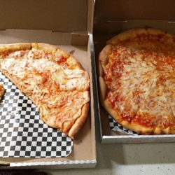 Carlo's Pizza - 2 piping hot large pizzas delivered to our door by a friendly smile!