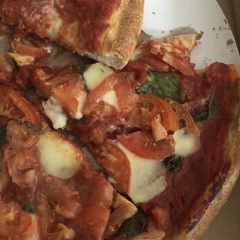 Kings Pizza Restaurant - a slice of pizza on a plate - Pizza Near Me - Kingston, New York