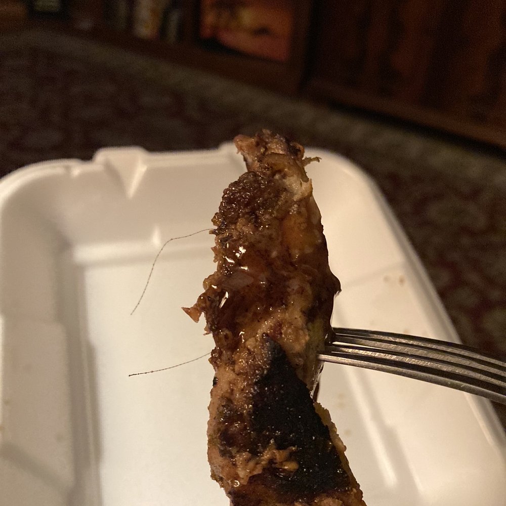 a piece of meat on a fork a piece of meat on a fork