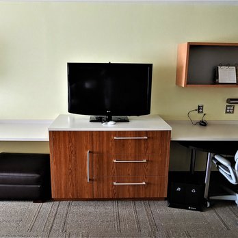 Home2 Suites by Hilton Augusta,GA - This is a view of the television, desk area, and more storage. Photo taken July 25, 2019. - Hotels Near Me - Augusta, Georgia Home2 Suites by Hilton Augusta,GA - This is a view of the television, desk area, and more storage. Photo taken July 25, 2019. - Hotels Near Me - Augusta, Georgia