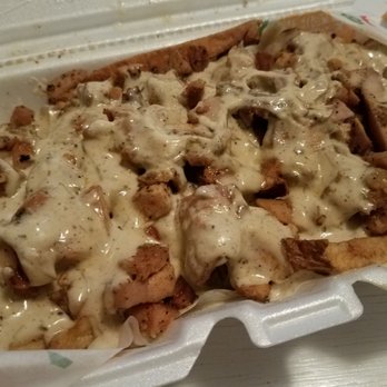 The Tattooed Pig - The Cluck Fries - hand cut fries, smoked chicken and jerk sauce - American Near Me - Aston, Pennsylvania The Tattooed Pig - The Cluck Fries - hand cut fries, smoked chicken and jerk sauce - American Near Me - Aston, Pennsylvania