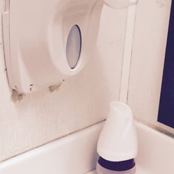 McDonald's - Dirty bathroom and broken hand soap container