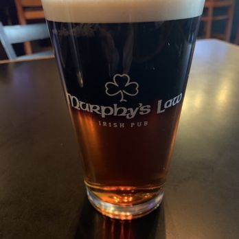 Murphy's Law - Black and tan drink- layered beer drink made of half stout (Guinness) and half pale! - Irish Near Me - Chandler, Arizona