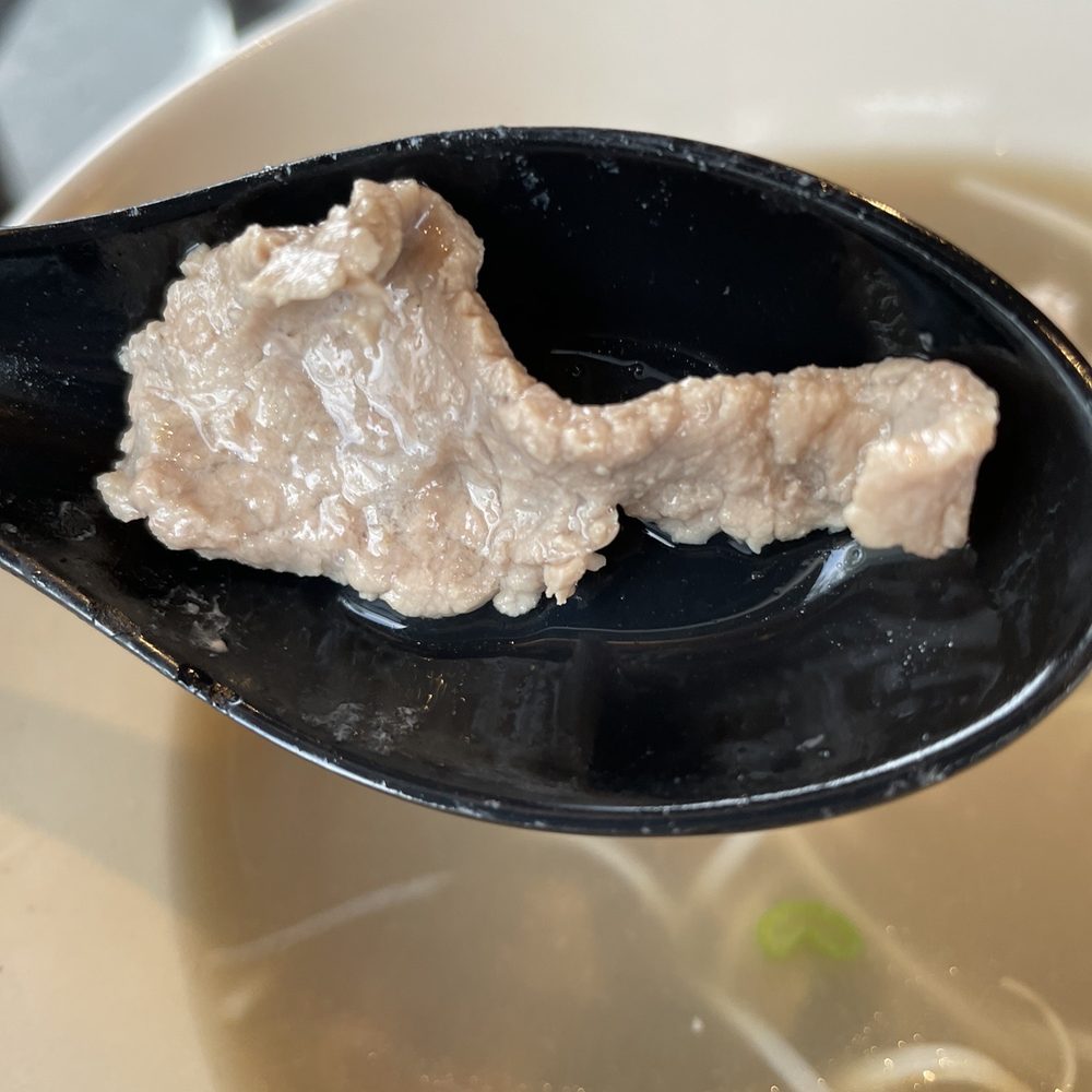 Pho Tango Vietnamese Bistro - a spoon with a piece of meat in it - Vietnamese Near Me - Hillsboro, Oregon Pho Tango Vietnamese Bistro - a spoon with a piece of meat in it - Vietnamese Near Me - Hillsboro, Oregon