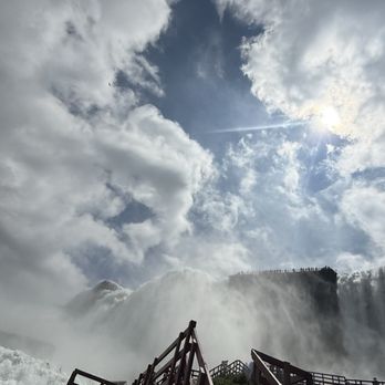Cave of the Winds - Upward angle of falls misting the air. In front, there's a staircase to climb that takes guests closer to the misty areas. - Landmarks & Historical Buildings Near Me - Niagara Falls, New York