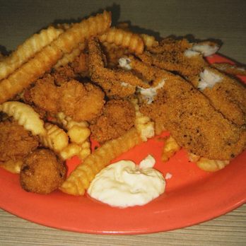 Doc's Seafood & Steaks - Pick two seafood platter; fried shrimp and fried fish with fries and coleslaw - Seafood Near Me - Orange Beach, Alabama Doc's Seafood & Steaks - Pick two seafood platter; fried shrimp and fried fish with fries and coleslaw - Seafood Near Me - Orange Beach, Alabama