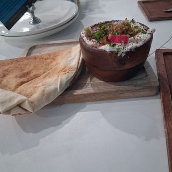 Sahara Bistro - Garlic spread and naan is complimentary - Mediterranean Near Me - Grand Rapids, Michigan Sahara Bistro - Garlic spread and naan is complimentary - Mediterranean Near Me - Grand Rapids, Michigan