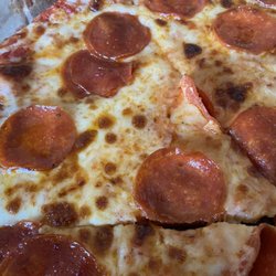 Casey's - Casey's pizza... The grease just flows off the pizza. Way too much sugar in the sauce.