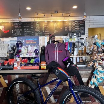 Red Raven - a woman sitting on a bike in a cafe - Coffee & Tea Near Me - Crosby, Minnesota Red Raven - a woman sitting on a bike in a cafe - Coffee & Tea Near Me - Crosby, Minnesota