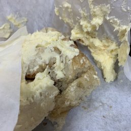 a half eaten pastry with a bite taken out of it a half eaten pastry with a bite taken out of it