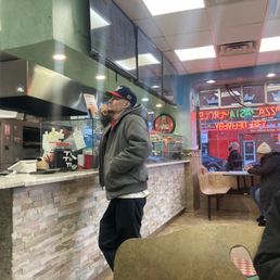 A guy waiting for his food