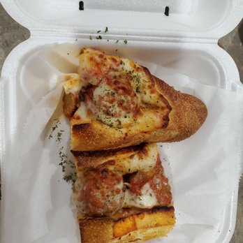 Matthew's Pizza Kitchen - Meatball Parm Sub with 3 meatballs and and 1/4 of the sandwich (the half at the top) you can see they just served a giant bread knot. - Italian Near Me - Cape Coral, Florida Matthew's Pizza Kitchen - Meatball Parm Sub with 3 meatballs and and 1/4 of the sandwich (the half at the top) you can see they just served a giant bread knot. - Italian Near Me - Cape Coral, Florida