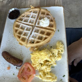 First Watch - Tri-fecta with pork sausage, scrambled eggs and a waffle with a side of berry chutney. Sausage was so-so, I recommend the bacon! - Breakfast & Brunch Near Me - Georgetown, Texas