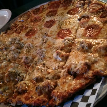 Chevys Bar & Grill - Very thin crust pizza, almost cracker like. - Pizza Near Me - Osage Beach, Missouri Chevys Bar & Grill - Very thin crust pizza, almost cracker like. - Pizza Near Me - Osage Beach, Missouri