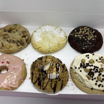 Crumbl - Beachwood - Top L: chocolate chip, lemon, chocolate brownie, doughnut, S'more, and chocolate chip cookie dough on Bottom R. - Bakeries Near Me - Beachwood, Ohio Crumbl - Beachwood - Top L: chocolate chip, lemon, chocolate brownie, doughnut, S'more, and chocolate chip cookie dough on Bottom R. - Bakeries Near Me - Beachwood, Ohio