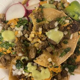 Carne asada tacos. I took a bite!