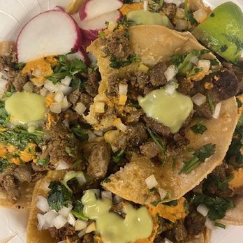 Tacos Decalli - Carne asada tacos. I took a bite! - Food Trucks Near Me - Elk Grove, California