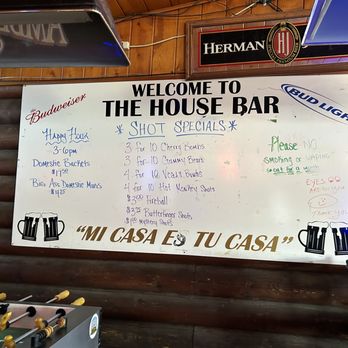 House Bar - a white board with a sign that says welcome to the house bar - Dive Bars Near Me - North Platte, Nebraska