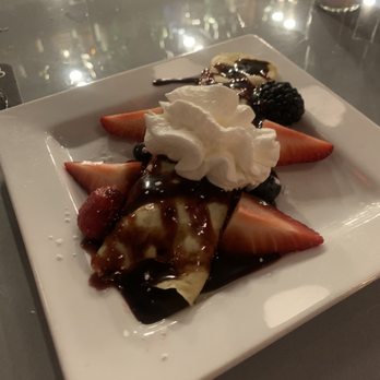 Victoria's - Chocolate mousse filled crepe with fresh berries! Too much chocolate sauce for me with the mousse, but yummy! - French Near Me - Oxford, Michigan Victoria's - Chocolate mousse filled crepe with fresh berries! Too much chocolate sauce for me with the mousse, but yummy! - French Near Me - Oxford, Michigan