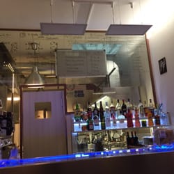 Pastamania Italia - Menu board - hand drawn to change out the menu. It also lets you see the chef cooking in the back.