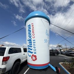 Big inflatable coffee in the parking lot from the opening week