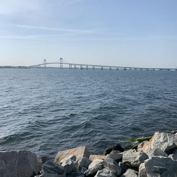 The Pineapple Club - a view of a bridge over the water - Bars Near Me - Newport, Rhode Island
