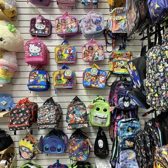Mauya City - Lunch pails. Love the Winnie the Pooh Honey Pot one at the top right. - Toy Stores Near Me - Cerritos, California