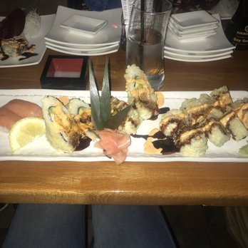 Sushi Blue - Left to right. Smoked salmon Nigiri, blue fusion roll, tigers eye roll. - Sushi Bars Near Me - Lexington, Kentucky